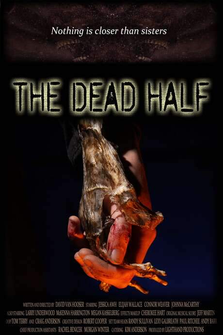   Half dead. All evil.  A different kind of haunted house suspense thriller movie - about four young filmmakers making a haunted house suspense thriller movie.  